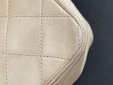 chanel beige quilted lambskin bag with gold hardware