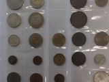 a lot of coins in a plastic bag on the table