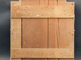an image of a wooden box on a gray background