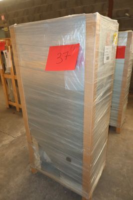 several pallets of plastic are stacked on top of each other in a warehouse