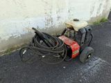a small machine that is sitting on the ground