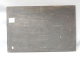 a piece of metal that is sitting on a table