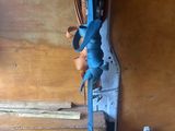 a picture of a tool rack with a wrench hanging from it ' s side