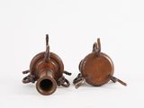 pair of antique bronze candlesticks with twisted handles