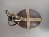 a wooden ball with a rope wrapped around it