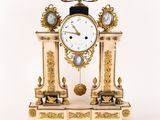 a clock that is sitting on top of a table