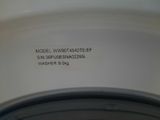 a close up of a washing machine with a label on it