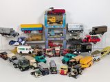 a lot of toy trucks that are sitting on a table