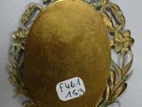a picture of a gold locke with a label on it
