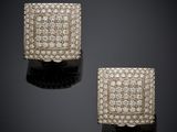 a pair of diamond earrings