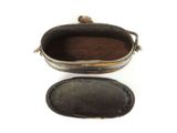 a small metal box with a handle and a tray with a handle