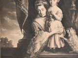 an old black and white photo of a woman holding a child