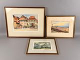 trois aquarelles encadrées représentant des maisons et une plage