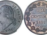 a close up of a coin on a white background