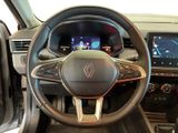 the interior of a car with a steering wheel and a dash board