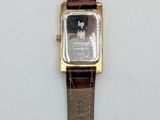 an image of a wrist watch with a brown leather strap