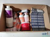 a cardboard box with a lot of different items inside of it