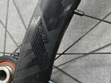a close up of a bicycle wheel with a spoke