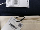 an image of a pair of pants with a price tag on them
