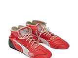 red puma sneakers with white laces and black soles