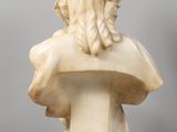 an antique marble bust of a woman on a clear pedestal