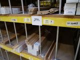 a lot of boxes of wood on the shelves