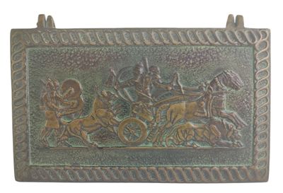 a metal plaque with a picture of a horse drawn carriage