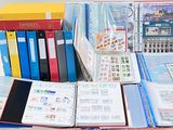 many different types of binders and books on the table
