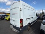 a white van that is parked in a parking lot