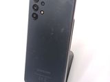 the back of a black samsung galaxy s9 with a camera attached to it