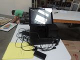 a man that is working on a laptop on a table