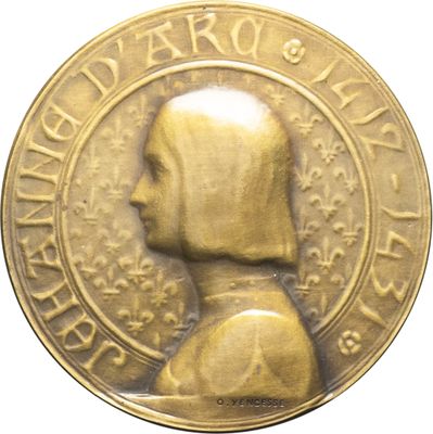 une image représentant une médaille d'or sur laquelle figure le profil d'un homme