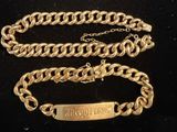 gold plated bracelet and bracelet with a nameplate on it