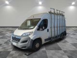 a picture of a white truck parked in a room