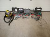 a lot of tools that are laying out on the floor