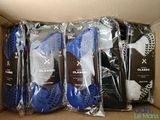 several pairs of cleable shoes are in a cardboard box
