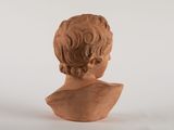 an image of a clay bust of a woman on a white background