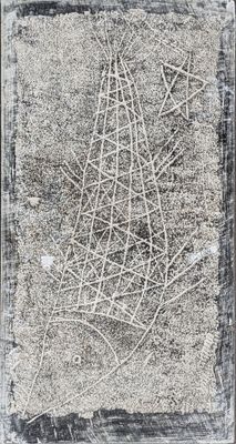 black and white photograph of a piece of wire on a cement surface