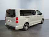 a picture of a white van parked in a room
