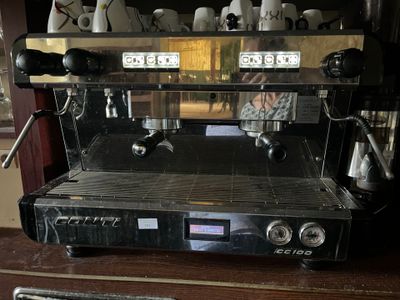 a coffee machine that is sitting on a table