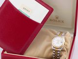 a red box with a watch inside of it
