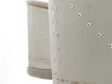 a close up of a pair of chairs with metal studding on them