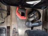 many tools that are sitting on a wooden table