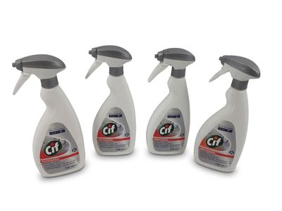 three spray bottles of cleaner on a white background