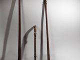 three different types of baseball bats on a white background