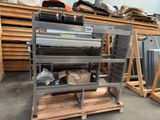 a metal rack with a lot of items on it