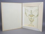 an open book with a drawing of a bird on it