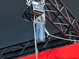 a man that is standing on a stage with a microphone