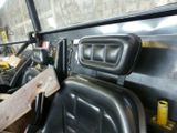 an image of a car with the door open and the seat up