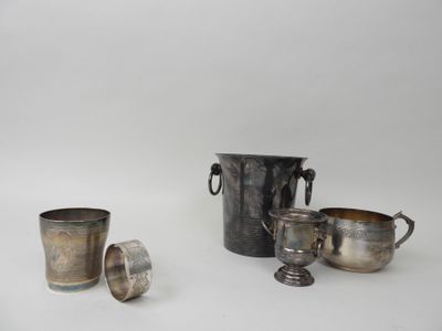 three silver cups and a silver vase on a white background